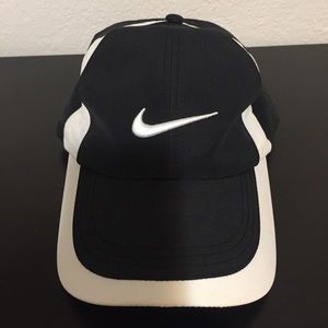 NIKE Hat. Black and white. Adjustable Velcro strap